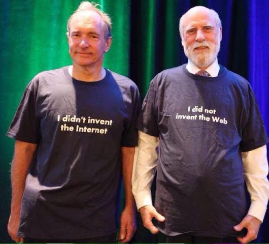 Tim Burners-Lee and Vinton Cerf stand next to each other wearing black t-shirts with white lettering. Tim’s shirt says “I didn’t invent the internet” and Vinton’s shirt reads “I did not event the Web”